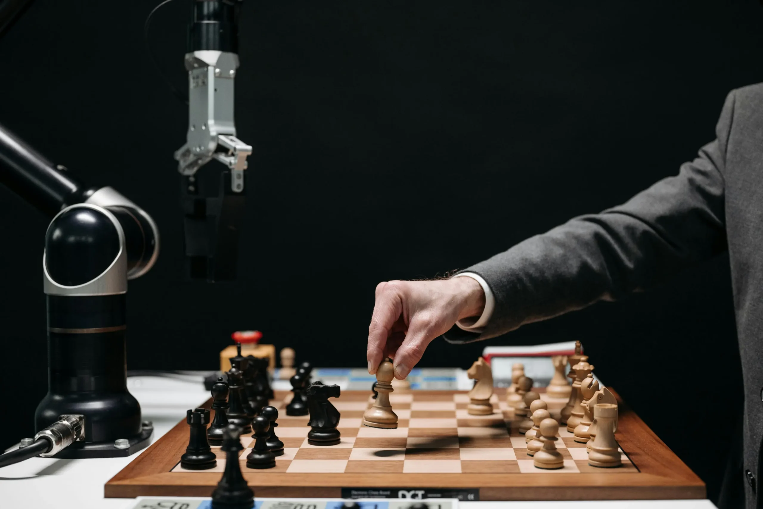 A person and Ai robot playing chess